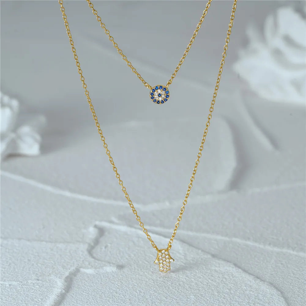 CANNER 925 Silver Devil Eyes Blue Zircon Pendant Necklace ATHLEXES