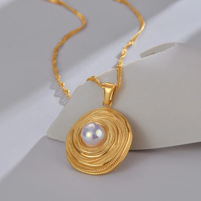 Lustrous Wavelet Gold Pendant with Moonstone ATHLEXES