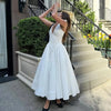 Chic White Backless Halter Dress for Summer Events ATHLEXES