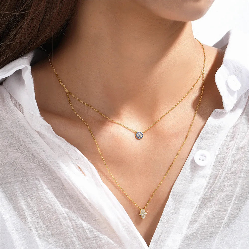 CANNER 925 Silver Devil Eyes Blue Zircon Pendant Necklace ATHLEXES