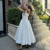 Chic White Backless Halter Dress for Summer Events ATHLEXES