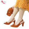 Royal Blue Elegance: Nigerian Pumps & Bag Set ATHLEXES