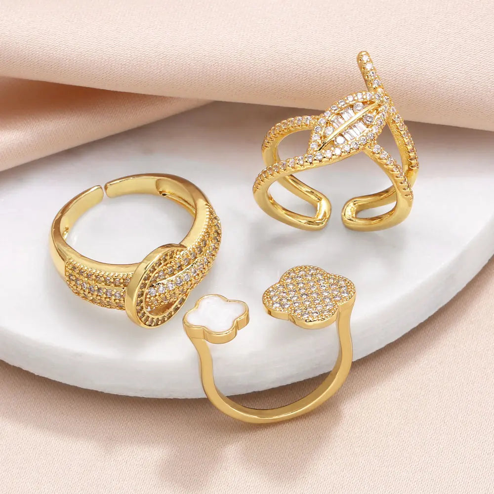 OCESRIO Mini Crystal Flower Open Ring in Gold Plated Copper ATHLEXES