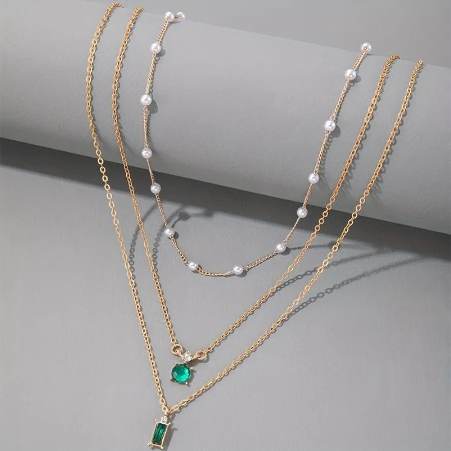 Emerald Elegance Layered Pearl Necklace ATHLEXES