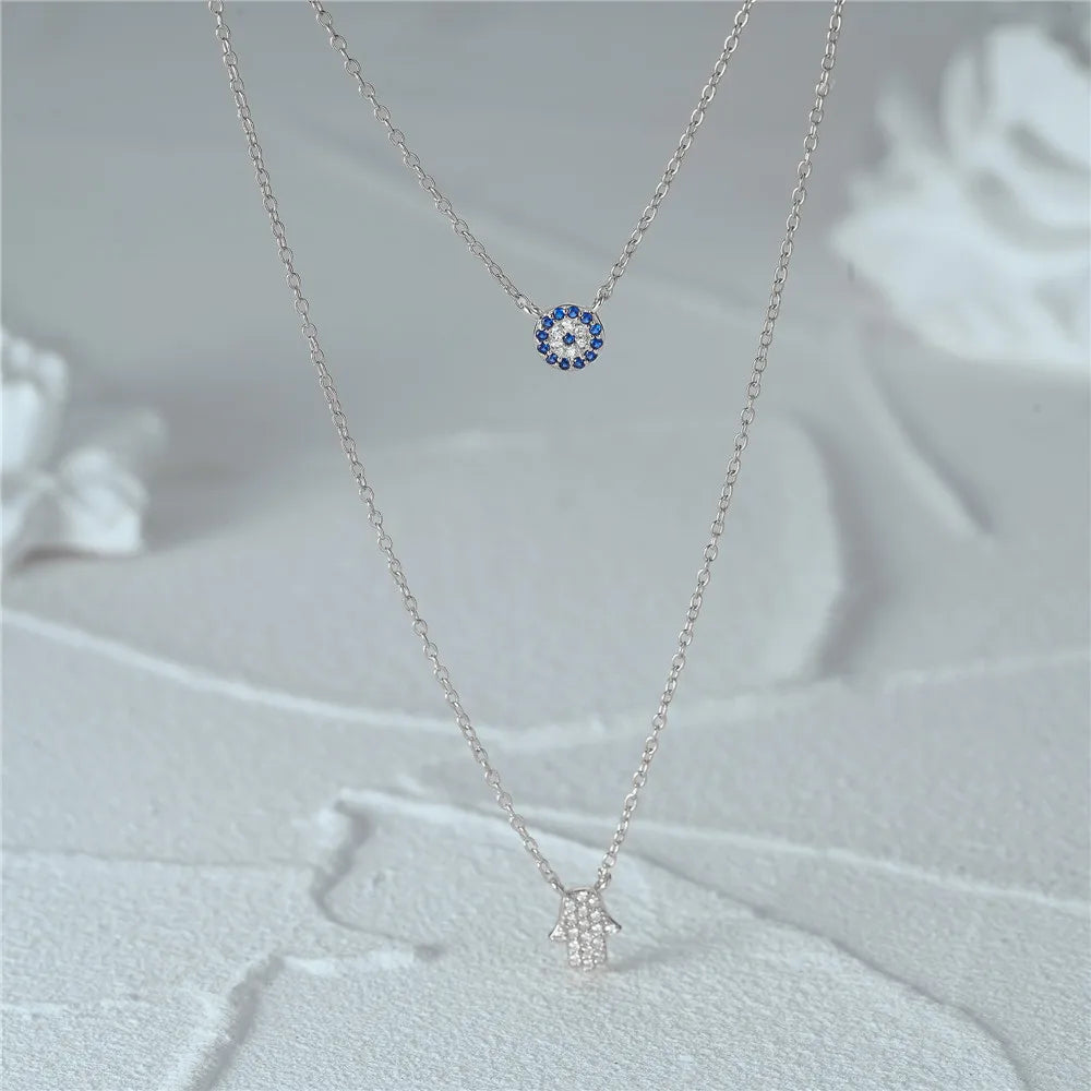 CANNER 925 Silver Devil Eyes Blue Zircon Pendant Necklace ATHLEXES