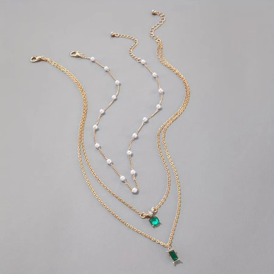 Emerald Elegance Layered Pearl Necklace ATHLEXES
